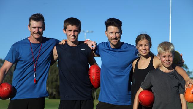 One on One Football creator Andrew Raines, centre, has quit the Suns to focus on his business. Picture: Supplied