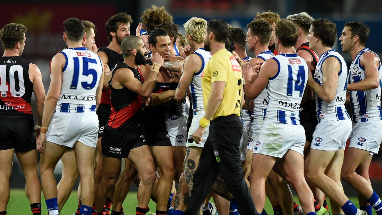 Essendon and North Melbourne tangled at quarter-time. Picture: Matt Roberts