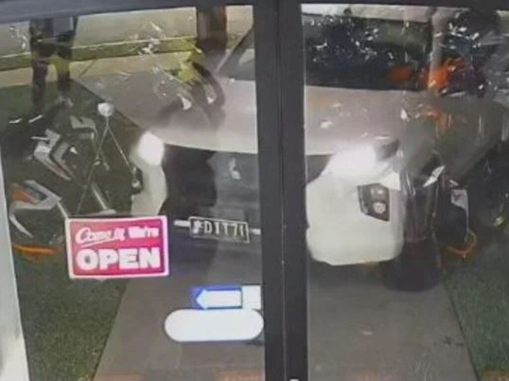 CCTV footage of the 2022 Mitsubishi Triton dual cab, stolen from Gracemere on Sunday, June 11, ramming the doors of Gladstone Motorcycles.