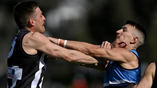 WRFL: Parkside’s Michael Jubb and Daniel Strnak of Point Cook Centrals get acquainted. Picture: Andy Brownbill