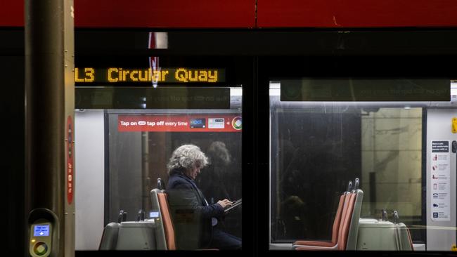 A sole traveller makes a journey on the light rail in Sydney's CBD. Picture: Getty Images