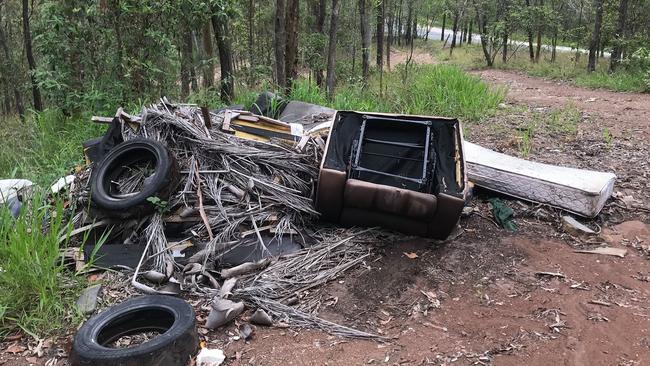 Sofas and tyres dumped just off Wuraga Rd.