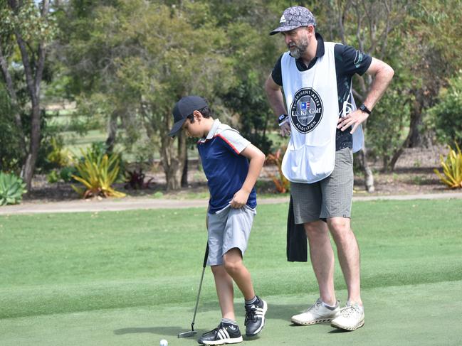 Sydney's Callum Casafus (boys nine years) set to putt during play at the US Kids Golf Foundation Australian Open at the Rockhampton Golf Club on September 28.