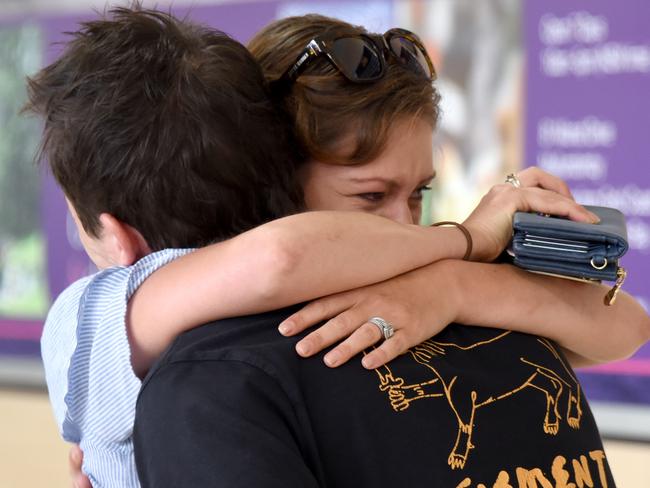 Feature on arrivals and departure gates of GC Airport. Pictured are Dennis and Danica Penberthy. Photo: Steve Holland