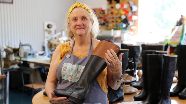 Shoe maker Jodie E. Morrison with some of the boots that she has made for the Hamilton musical. Picture: Tim Hunter