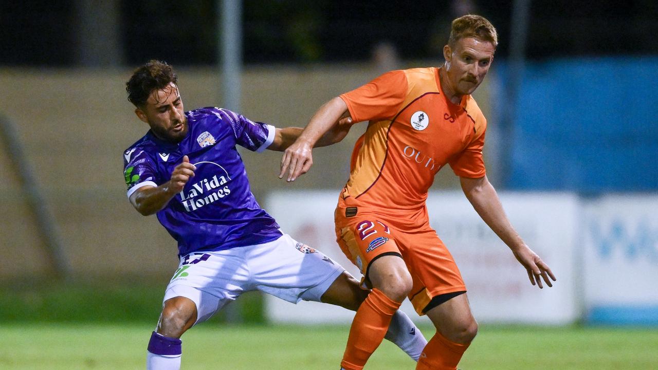 Perth’s Jarrod Carluccio (left) and Brisbane’s Ben Halloran battle for possession during the Glory’s 4-2 win in Darwin. Picture: Mark Brake/Getty Images