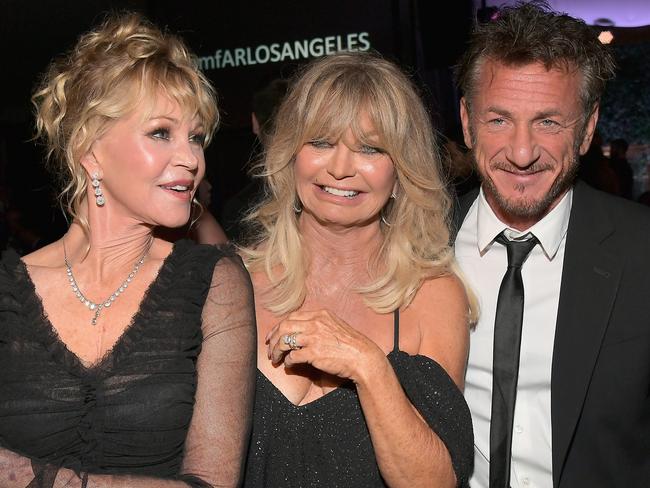 Sean Penn, right, with Melanie Griffith and Goldie Hawn. Picture: Getty Images