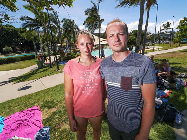 The fatal shark attack has given German tourists Lisa Breitsprecher and Greg Bienkowski second thoughts about swimming. Picture: Nigel Hallett