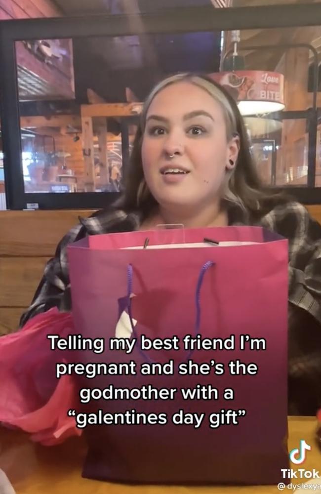 @dyslexya had taken her friend out for a Galentine’s Day meal, only to use the present to reveal she is pregnant. Picture: TikTok/@dyslexya.