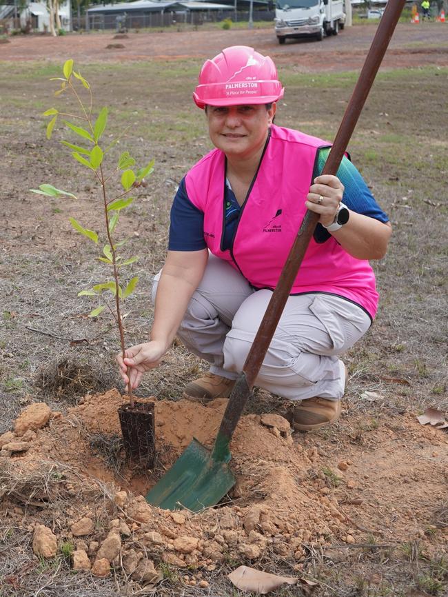 Athina Pascoe-Bell, Mayor City of Palmerston, checking out new trees in Tracy Park, Woodroffe planted in November. Photo: City of Palmerston