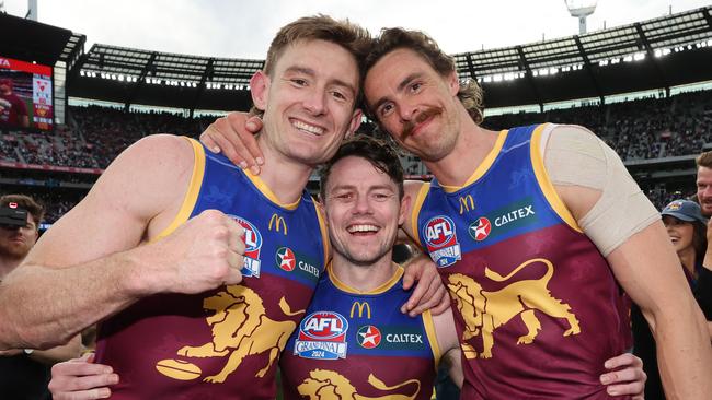 MELBOURNE , AUSTRALIA. September 28, 2024. AFL Grand Final between the Brisbane Lions and Sydney Swans at the MCG. Winning Brisbane Lions players Harris Andrews, Lachie Neale and Joe Daniher. Picture: David Caird