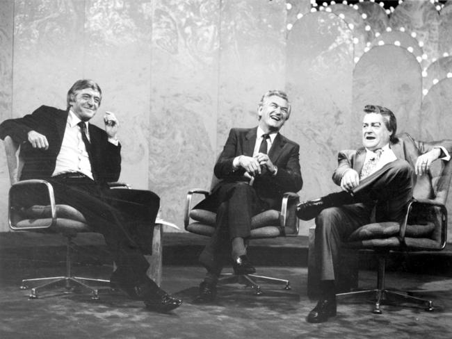 Old episode of TV personality Michael Parkinson (L) interviews Prime Minister Bob Hawke and actor Max Gillies. The ABC has released several episodes with “trigger warnings” about the content.