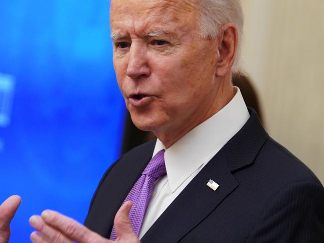 US President Joe Biden speaks about the Covid-19 response before signing executive orders in the State Dining Room of the White House in Washington, DC, on January 21, 2021. (Photo by MANDEL NGAN / AFP)