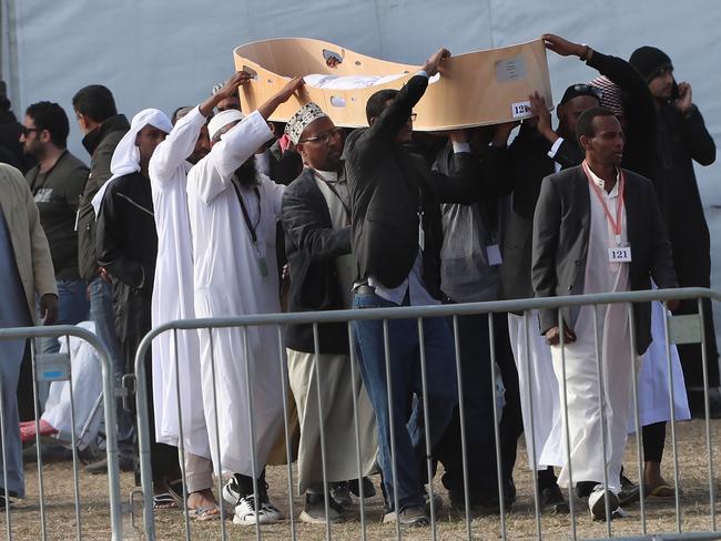  Three-year-old Mucaad Ibrahim, the youngest victim of the mass shootings in Christchurch, New Zealand, is carried to his final resting place by family members. Picture Gary Ramage