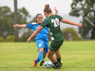 GOOD CHALLENGE: South West Queensland Thunder's Jess Fry (left) tackles her Western Pride opponent. The Thunder play Brisbane Roar at Clive Berghofer Stadium today from 2.30pm. Picture: DSL Photography