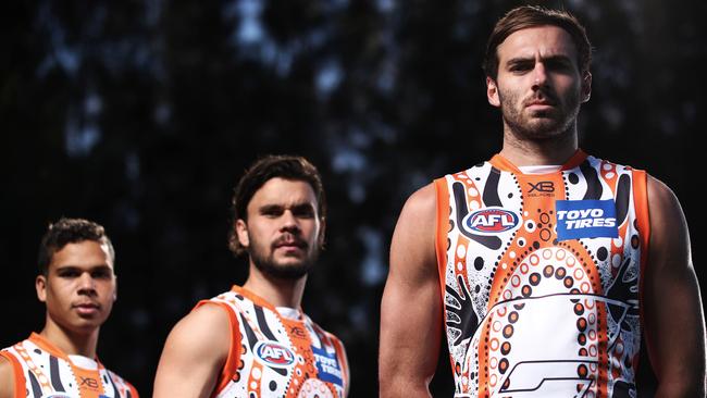 Jeremy Finlayson, Zac Williams and Ian Hill reveal the Giants’ 2019 Indigenous jumper. Picture: Phil Hillyard