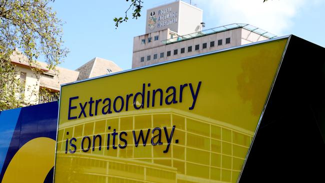 Signs on the old Royal Adelaide Hospital promoting the redevelopment, and ‘reactivation’ of the site. Picture: Dylan Coker