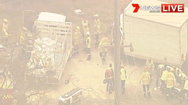 Emergency responders at the scene of a truck collision in Luddenham. Picture: 7News