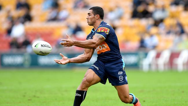 BRISBANE, AUSTRALIA - JUNE 20: Jamal Fogarty of the Titans passes the ball during the round six NRL match between the Gold Coast Titans and the St George Illawarra Dragons at Suncorp Stadium on June 20, 2020 in Brisbane, Australia. (Photo by Bradley Kanaris/Getty Images)