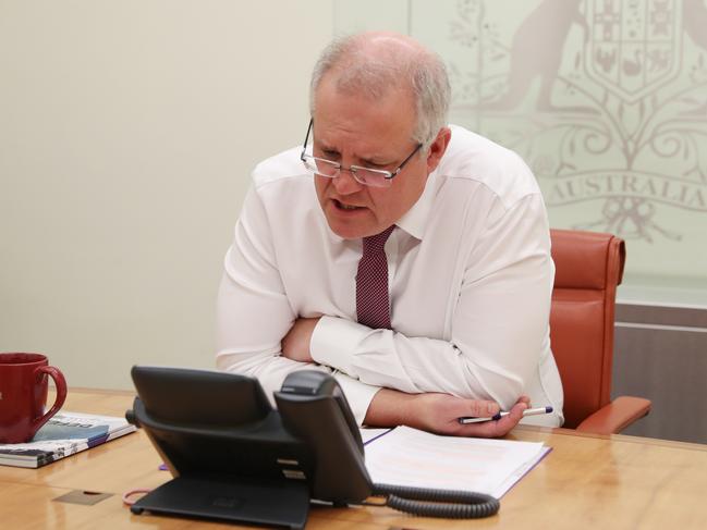 Prime Minister Scott Morrison speaks on the phone with US President Donald Trump this morning from Australian Parliament House. Picture: NCA NewsWire / Adam Taylor