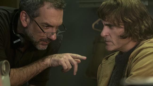 Director Todd Phillips, left, and Joaquin Phoenix on the set of Joker, which has been nominated for 11 Oscars including Best Picture, Best Actor and Best Director.