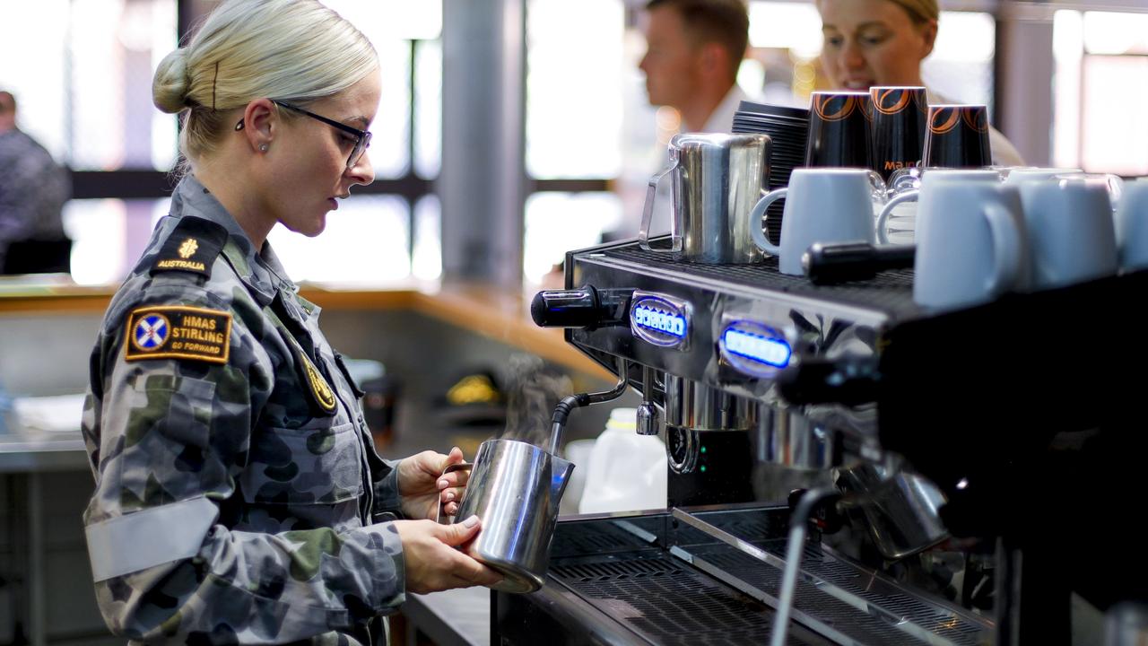 Navy Maritime Logistics Support Operations Anjay Letch prepares coffee for colleagues at HMAS Stirling.