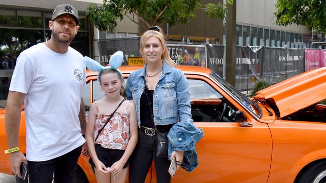 Clinton Ambrey, Kaprie Petersen and Amy Boyle check out the show ‘n’ shine in Rockhampton’s Quay Street during Rockynats. Photo: Pam McKay