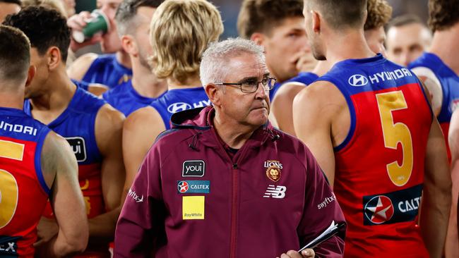 Lions coach Chris Fagan with his charges on Saturday night. Picture: Dylan Burns/AFL Photos via Getty Images