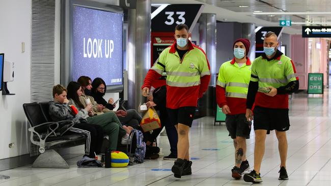 Workers at Sydney’s Domestic Airport Terminal last month. Picture: Gaye Gerard