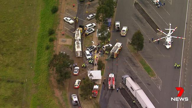 The debris-strewn crash scene at the Frank Partridge Rest Area. Picture: Channel 7