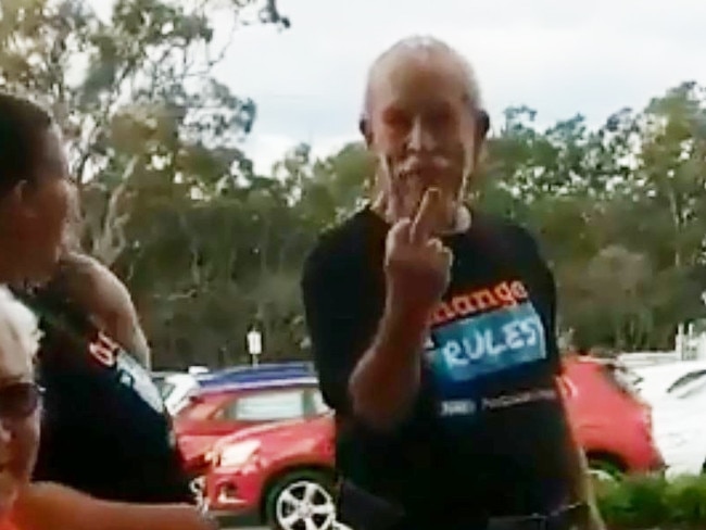 In the video, taken on Friday at Burpengary, the man starts by calling an LNP volunteer videoing the incident a prick.