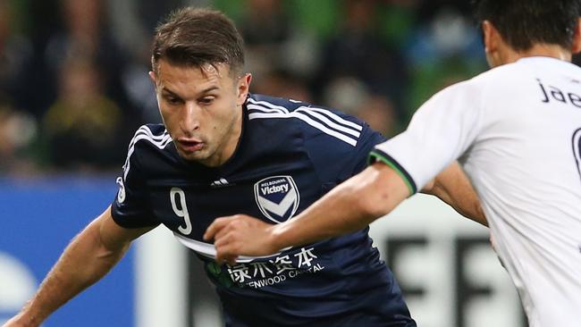 Melbourne Victory forward Kosta Barbarouses in action against Jeonbuk Motors in his last home game for the club.