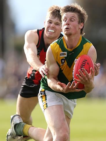 Gippsland Football League Grand Final match between Maffra Eagles and Leongatha Parrots. Maffra became the 2016 premiers, defeating Leongatha 13.10 (88) to 9. 16 (67). James Read gets the tackle on Christopher Verboon. Picture: Yuri Kouzmin