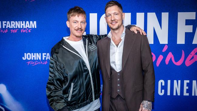 James and Rob Farnham at the opening of the biopic about their dad. Picture: Jake Nowakowski