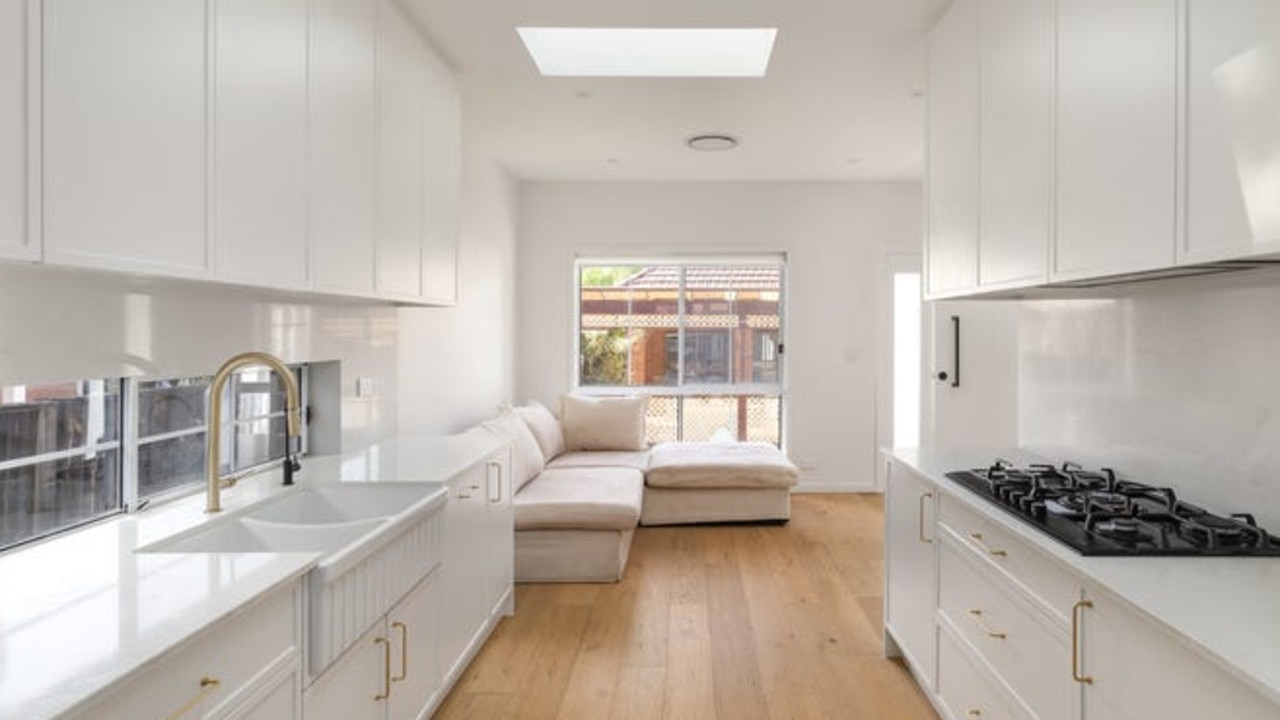 The granny flat has modern interiors and is full of light.