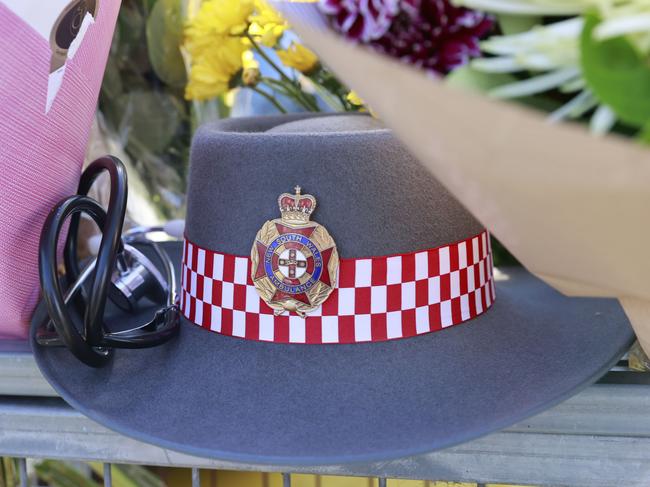 Tributes left at Campbelltown McDonald’s on Saturday. Picture: Tim Hunter