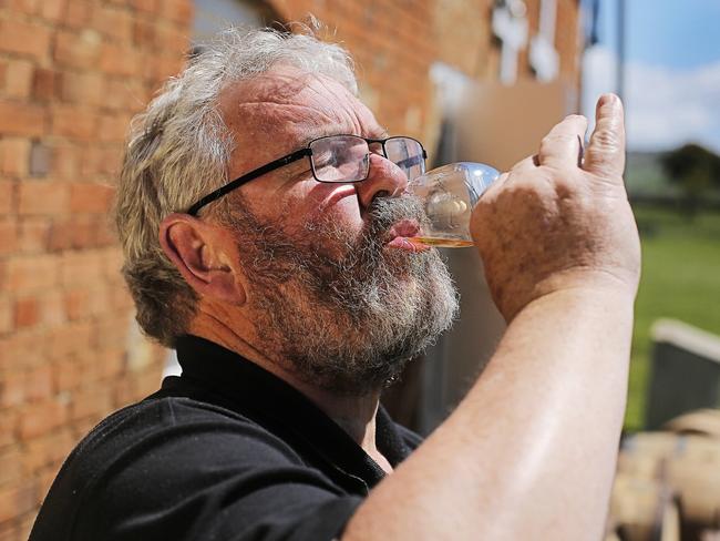 Every barrel at the Nant distillery near Bothwell needs to be sampled by the likes of whisky taster Mark Nicholson during the due diligence audit in preparation for Australian Whisky Holdings Limited taking possession.  Picture: MATHEW FARRELL