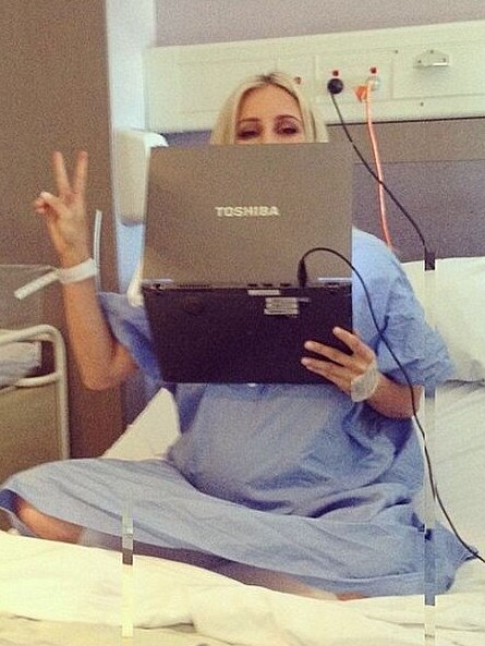 Roxy Jacenko working from her hospital bed as she went into labour with her first child, Pixie. Picture: Supplied: Roxy Jacenko