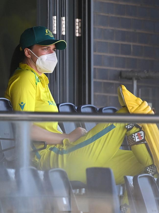 McGrath sits in the stands on her own waiting to bat in the gold medal match against India. Picture: Alex Davidson / Getty Images