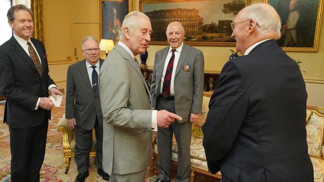 King Charles III (C), along with Master of The King's Household, Vice Admiral Sir Tony Johnstone-Burt (L) during an audience with veterans of the Korean War. Picture: WPA Pool/Getty Images