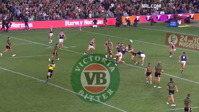 Burgess drops the ball following strong defensive contact.