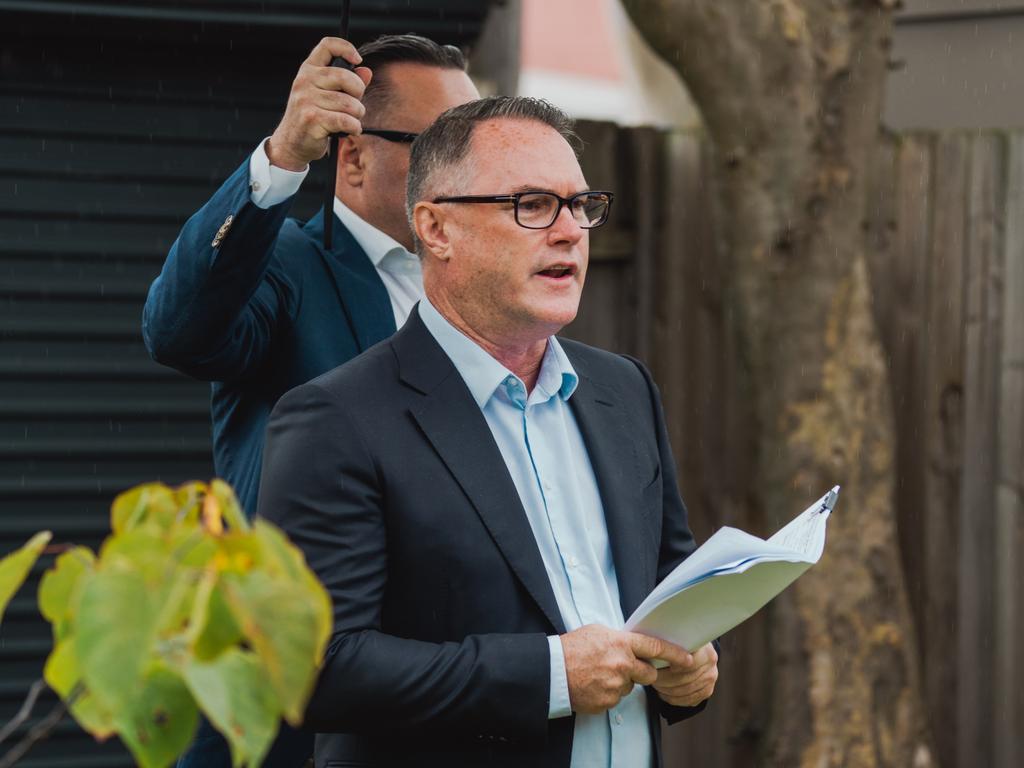 Real estate expert John McGrath at a Sydney auction.