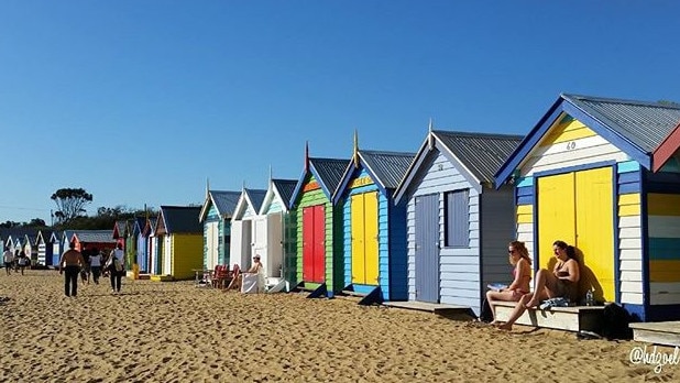 The bathing boxes at Brighton Beach have long been popular with tourists. Photo: Helen DZoel