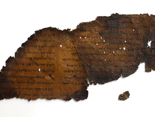 A picture taken on May 2, 2018 at the Israel Antiquities Authority's Dead Sea scrolls conservation laboratory in Jerusalem shows a large fragment of a scroll found in "Cave 11". Picture: Gali Tibbon