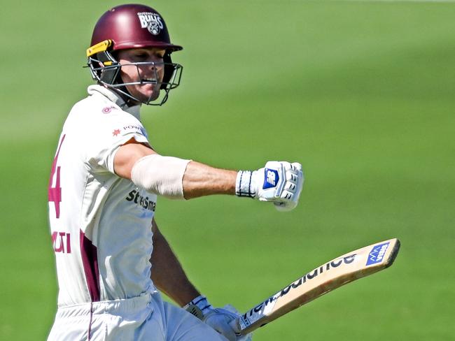 ADELAIDE, AUSTRALIA - MARCH 17: Jack Wildermuth of the Queensland Bulls brings up his 100 during the Sheffield Shield match between South Australia and Queensland at Karen Rolton Oval, on March 17, 2025, in Adelaide, Australia. (Photo by Mark Brake/Getty Images)