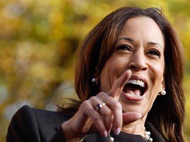 TOPSHOT - US Vice President and Democratic presidential candidate Kamala Harris speaks during a campaign rally at Riverside Park in Grand Rapids, Michigan, October 18, 2024. (Photo by KAMIL KRZACZYNSKI / AFP)