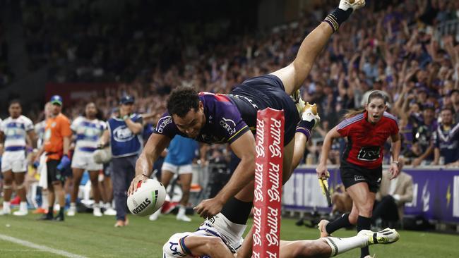 MELBOURNE, AUSTRALIA - MARCH 16: Xavier Coates of the Storm scores the match winning try during the round two NRL match between Melbourne Storm and New Zealand Warriors at AAMI Park, on March 16, 2024, in Melbourne, Australia. (Photo by Daniel Pockett/Getty Images)