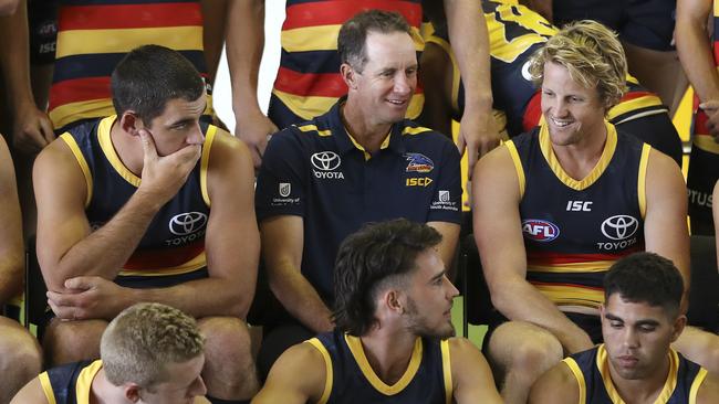 Adelaide co-captains Taylor Walker and Rory Sloane talk to coach Don Pyke. Picture: Sarah Reed