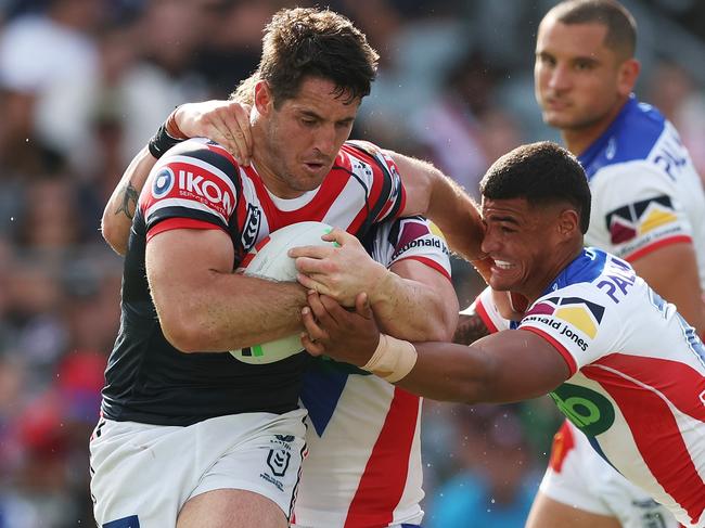 GOSFORD, AUSTRALIA - FEBRUARY 23: Nat Butcher of the Roosters is tackled during the 2025 NRL Pre-Season Challenge match between Sydney Roosters and Newcastle Knights at Industree Group Stadium on February 23, 2025 in Gosford, Australia. (Photo by Mark Metcalfe/Getty Images)