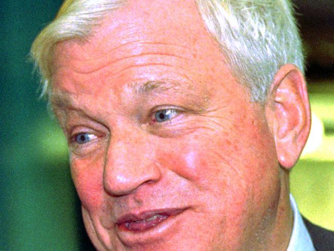 FILE - In a Oct. 23, 1997 file photo, Richard Mellon Scaife, owner and publisher of the Tribune Review newspapers in Pittsburgh and Greensburg, Pa., greets visitors as they enter the paper's new facility in Warrendale, Pa., during the dedication of the building. Scaife said in a column published Sunday, May 18, 2014, that he has an untreatable form of cancer. The 81-year-old Scaife is an heir to the Mellon banking fortune and is a notable backer of conservative causes. He serves as the vice chairman of the board of the Heritage Foundation. (AP Photo/Keith Srakocic, File)